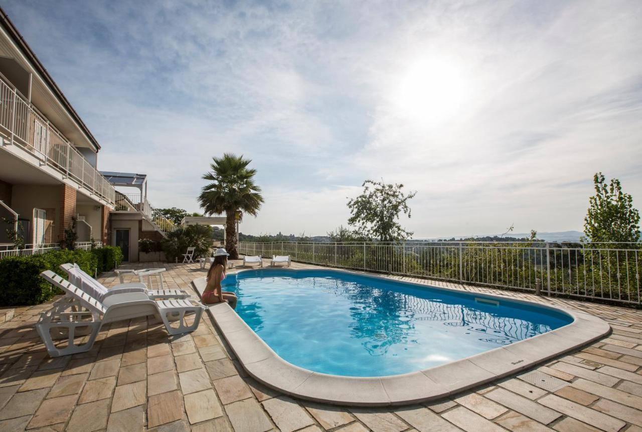 Holiday Residence Belohorizonte Macerata Bagian luar foto